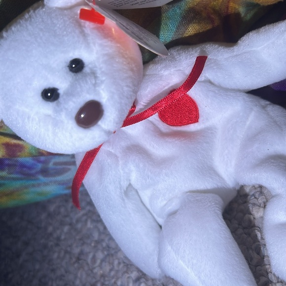 default in nose it was suppose to be black but only a couple have brown noses - Picture 3 of 4